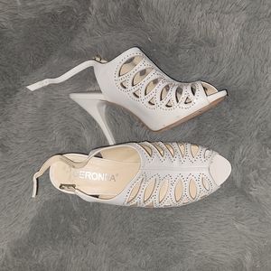 White leather heeled shoes